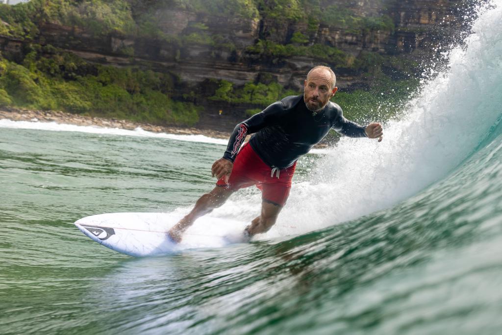 Tom Carroll photographed in the surf for Bioglan commercial campaign